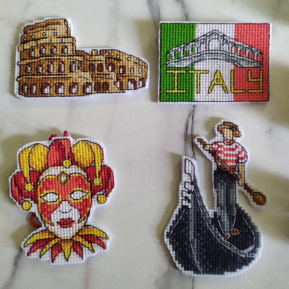 Italy Magnets P-309 / SR-309 Cross Stitch Kit featuring colorful threads and plastic canvas for crafting.